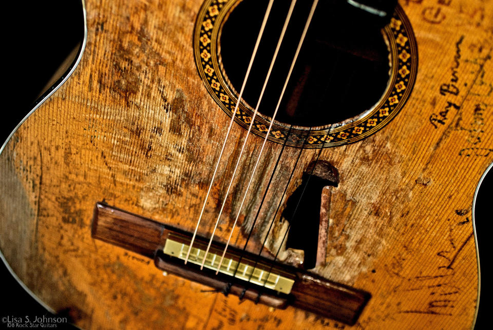 This April 26, 2009 photo provided by Lisa S. Johnson shows details of Willie Nelson's guitar, named Trigger. The instrument, featured in Johnson's new book, "108 Rock Star Guitars," has a hole worn through it, and is inscribed with dozens of autographs. (AP Photo/Lisa S. Johnson)