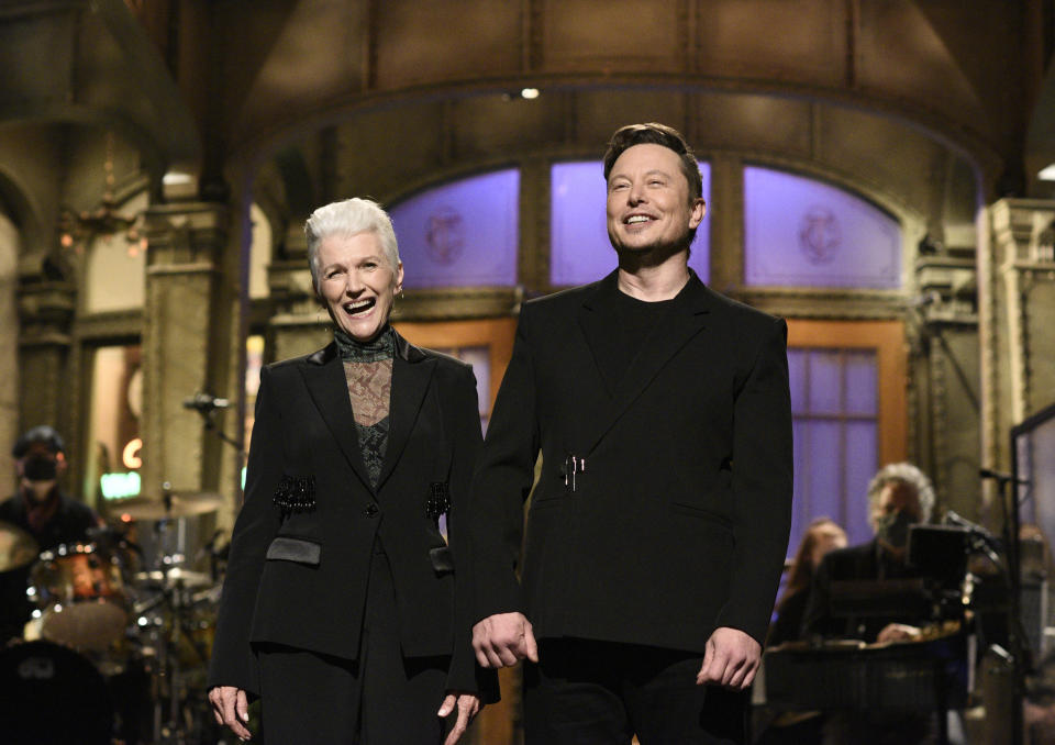 This image released by NBC shows host Elon Musk with his mother Maye as he delivers his opening monologue on "Saturday Night Live" in New York on May 8, 2021. (Will Heath/NBC via AP)