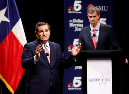 Sen. Ted Cruz (R-TX) makes his final remarks as Rep. Beto O'Rourke (D-TX) listens during a debate for Texas U.S. Senate seat at the Southern Methodist University in Dallas, Texas, U.S., September 21, 2018. Tom Fox/The Dallas Morning News/Pool via REUTERS