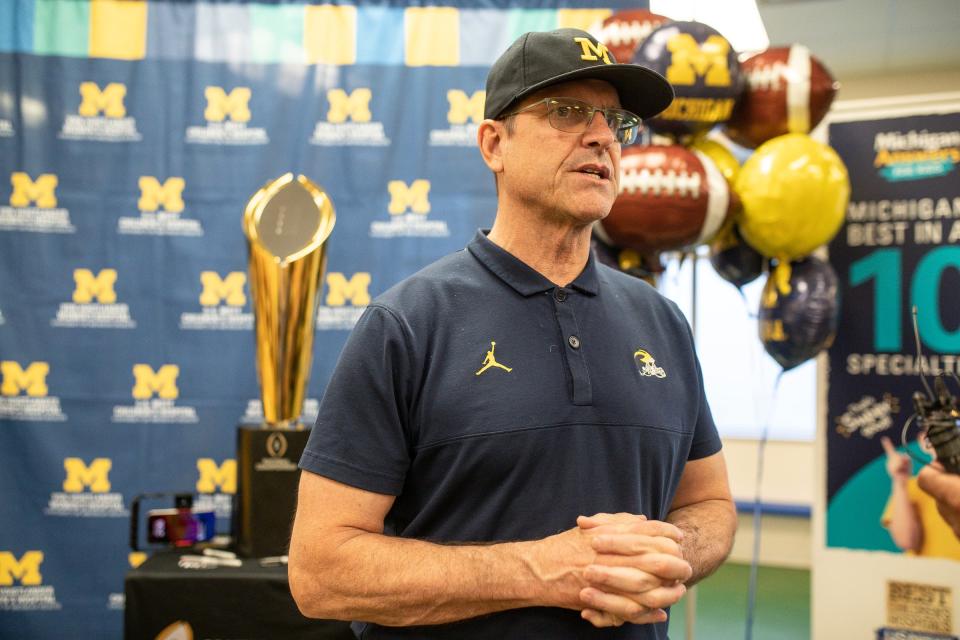 Michigan head coach Jim Harbaugh speaks to media members at C.S. Mott Children's Hospital in Ann Arbor on Friday, Jan. 12, 2024.