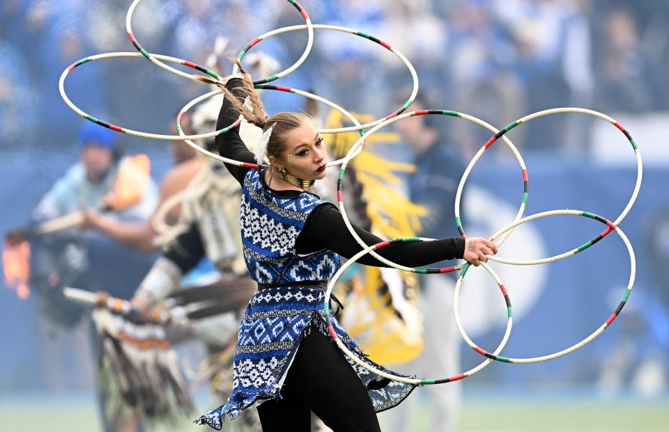 A performer dances as BYU and Oklahoma play at LaVell Edwards Stadium in Provo on Saturday, Nov. 18, 2023. | Scott G Winterton, Deseret News