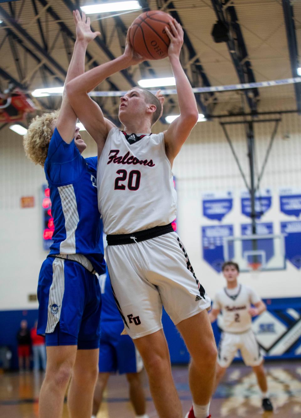 Fairfield Union's Caleb Schmelzer (20)  puts up a shot against Galllia Academy in boys basketball SE Division II district semifinals on March 1, 2023 in Chillicothe, Ohio. Fairfield Union defeated Gallia Academy at the buzzer 40-37 in overtime. 