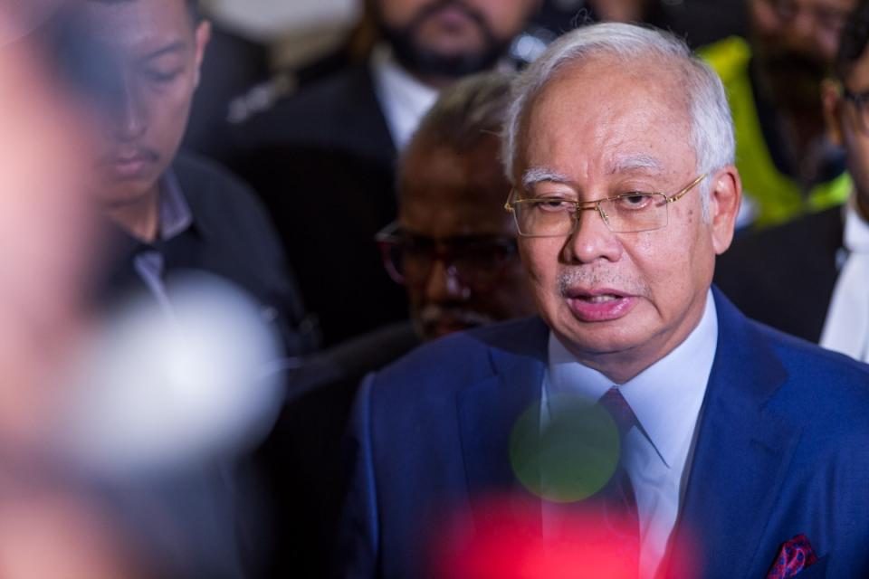 Najib Razak speaks to media after being charged