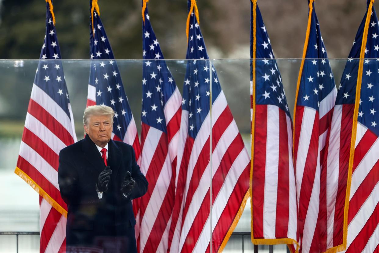 <p>President Donald Trump greets the crowd at the ‘Stop The Steal’ Rally on 6 January 2021 in Washington, DC</p> ((Getty Images))