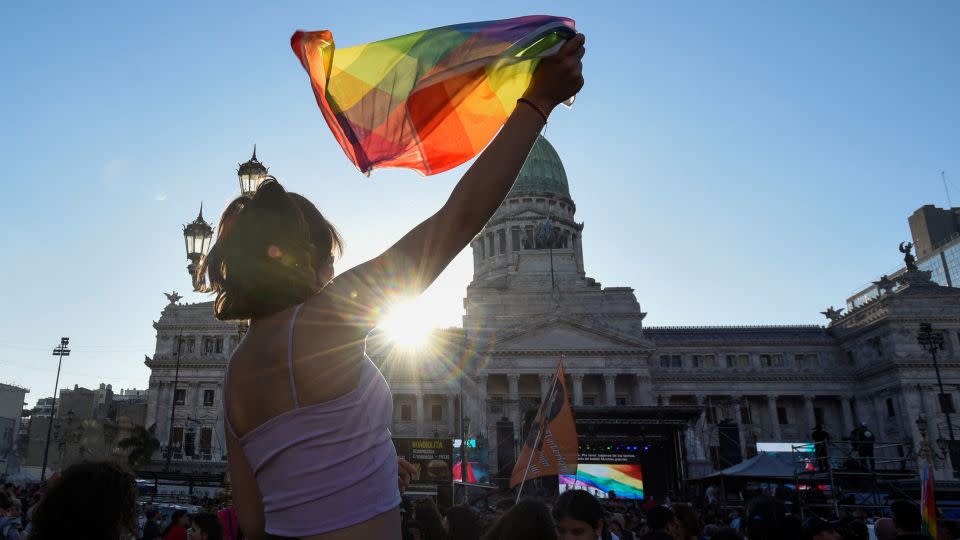 People take part in the LGBTQ Pride Parade in front of the Congress building in Buenos Aires, Argentina, on November 4, 2023. - Martin Cossarini/Reuters