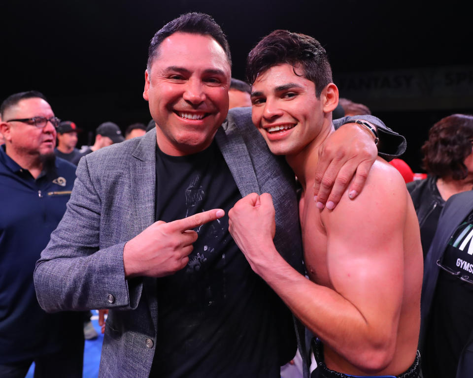 INDIO, CA - MARCH 30: Ryan Garcia celebrating with Oscar De La Hoya inside the ring after his win against Jose Lopez on March 30, 2019 at Fantasy Springs Casino in Indio, CA (Photo by Tom Hogan/Golden Boy/Getty Images)