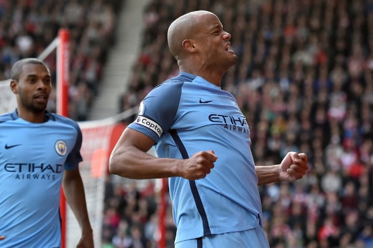 Manchester City's defender Vincent Kompany celebrates after scoring the opening goal of the English Premier League football match between Southampton and Manchester City at St Mary's Stadium in Southampton, southern England on April 15, 2017