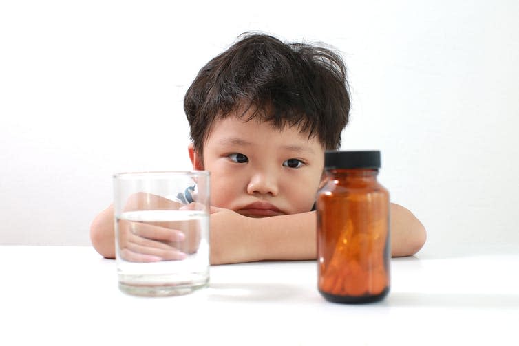 <span class="caption">All antibiotics have an impact on the body, even when taken at a low dose.</span> <span class="attribution"><a class="link " href="https://www.shutterstock.com/image-photo/father-give-some-medicines-asian-child-490175761?src=L94jKBAwOdnNdIPbsZsDUw-1-56" rel="nofollow noopener" target="_blank" data-ylk="slk:Shutterstock/Toey Toey;elm:context_link;itc:0;sec:content-canvas">Shutterstock/Toey Toey</a></span>