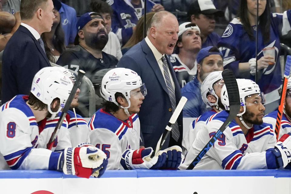 New York Rangers head coach Gerard Gallant yells to his players during the second period in Game 4 of the NHL Hockey Stanley Cup playoffs Eastern Conference finals against the Tampa Bay Lightning, Tuesday, June 7, 2022, in Tampa, Fla. (AP Photo/Chris O'Meara)