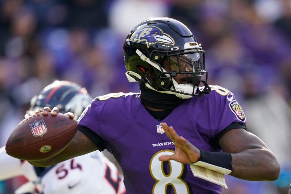 Baltimore Ravens quarterback Lamar Jackson (8) looks to pass in the first half of an NFL football game against the Denver Broncos, Sunday, Dec. 4, 2022, in Baltimore. (AP Photo/Patrick Semansky)