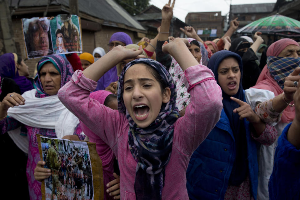 Kashmiris shout slogans during a protest after Friday prayers against the abrogation of article 370, on the outskirts of Srinagar, Indian controlled Kashmir, Friday, Oct. 4, 2019. For the last two months, mobile phone and internet services have been shut down in Indian-controlled Kashmir after New Delhi stripped the region of its semi-autonomous powers and implemented a strict clampdown. It has sent tens of thousands of extra troops to the region and detained thousands of people. (AP Photo/ Dar Yasin)