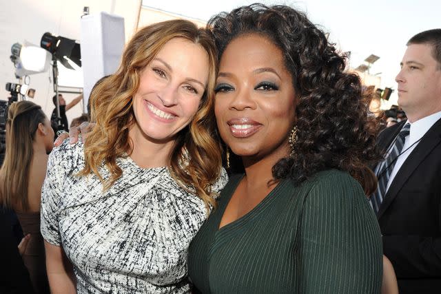 <p>Kevin Mazur/WireImage</p> Julia Roberts and Oprah Winfrey