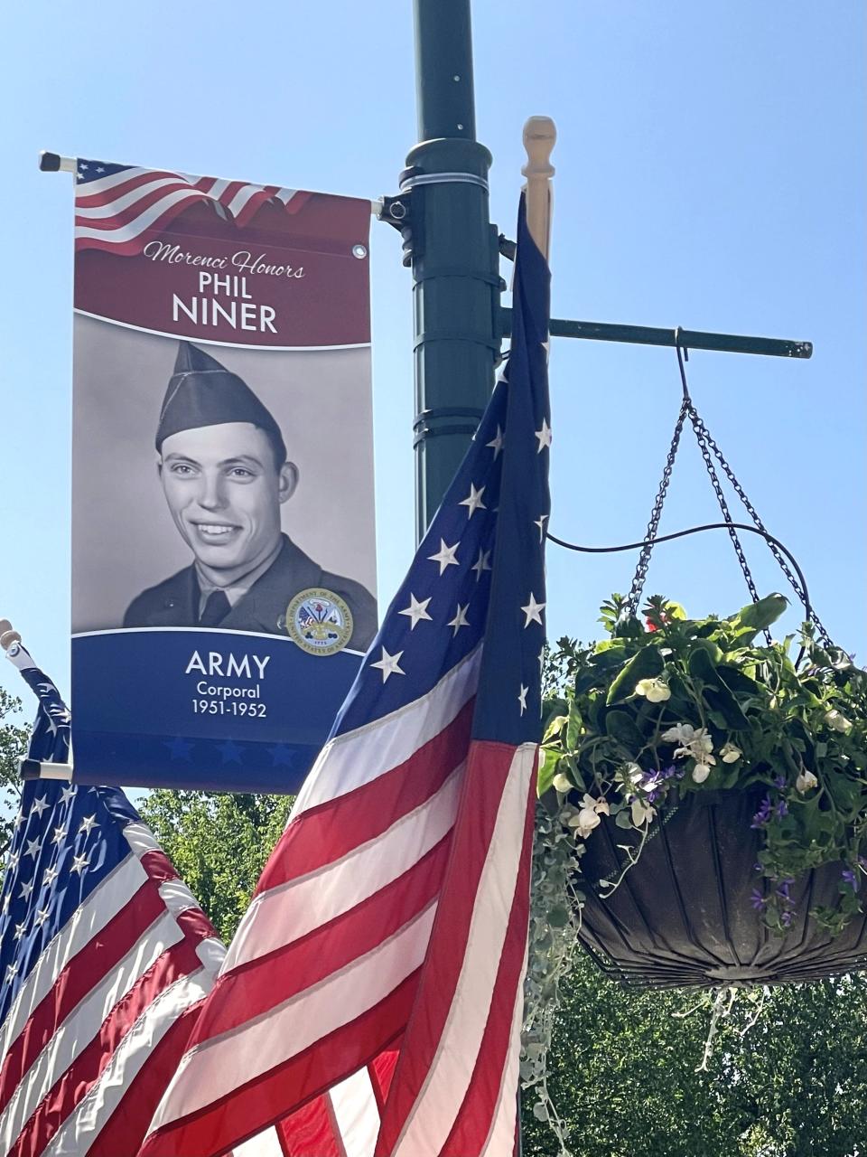 One of the Hometown Heroes banners in Morenci's downtown display in 2023 is pictured. This banner is of Phil Niner, a corporal in the United States Army from 1951-52.