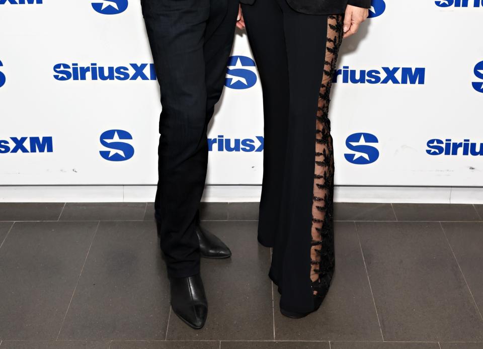 Damian Hurley and Elizabeth Hurley wearing black pointed shoes at SiriusXM