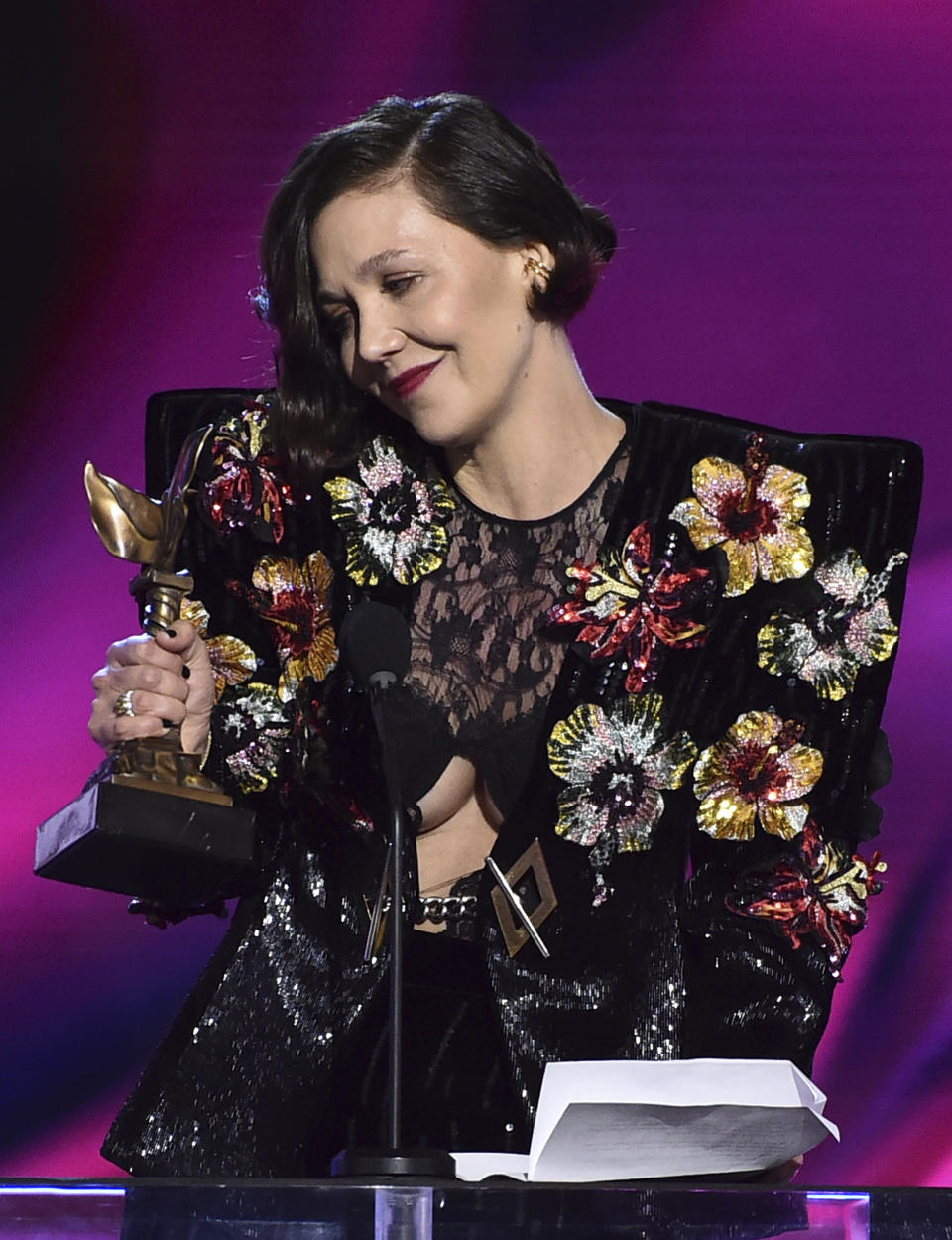 Maggie Gyllenhaal accepts the award for best screenplay for "The Lost Daughter" at the 37th Film Independent Spirit Awards on Sunday, March 6, 2022, in Santa Monica, Calif. (Photo by Jordan Strauss/Invision/AP)