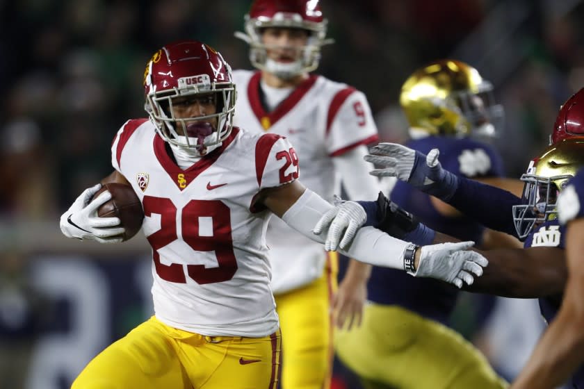 Southern California running back Vavae Malepeai (29) runs the ball against Notre Dame in the first half of an NCAA college football game in South Bend, Ind., Saturday, Oct. 12, 2019. (AP Photo/Paul Sancya)