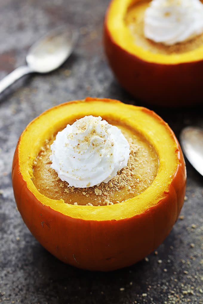 <p>Take your pumpkin cheesecake obsession to the next level by eating spoonfuls of creamy goodness out of mini pumpkins. </p><p><strong>Get the recipe at <a href="http://lecremedelacrumb.com/2014/10/pumpkin-cheesecake-stuffed-pumpkins.html" rel="nofollow noopener" target="_blank" data-ylk="slk:Le Creme De La Crumb;elm:context_link;itc:0;sec:content-canvas" class="link ">Le Creme De La Crumb</a>.</strong></p>