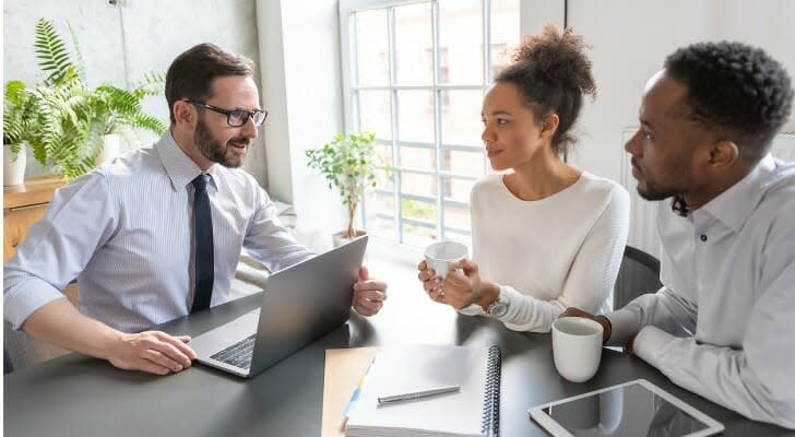 Young couple with their financial advisor