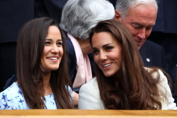 Pippa Middleton (L) and Catherine, Duchess of Cambridge sit in the Royal Box during the Gentlemen's Singles final match between Roger Federer of Switzerland and Andy Murray of Great Britain on day thirteen of the Wimbledon Lawn Tennis Championships at the All England Lawn Tennis and Croquet Club on July 8, 2012 in London, England. (Photo by Clive Brunskill/Getty Images)