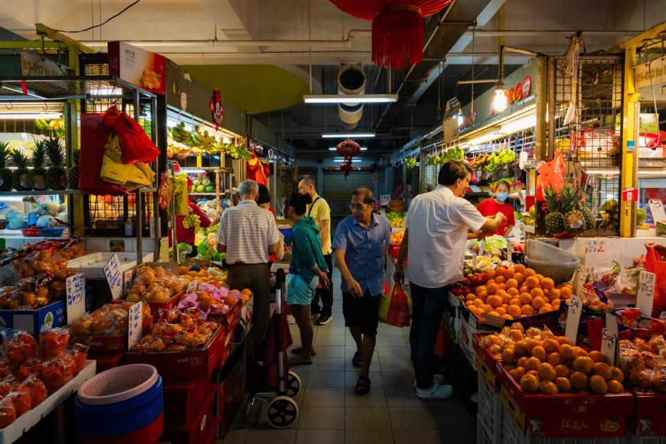 Fruit stalls at a wet market in Singapore, on Wednesday, Feb. 14, 2024. 
