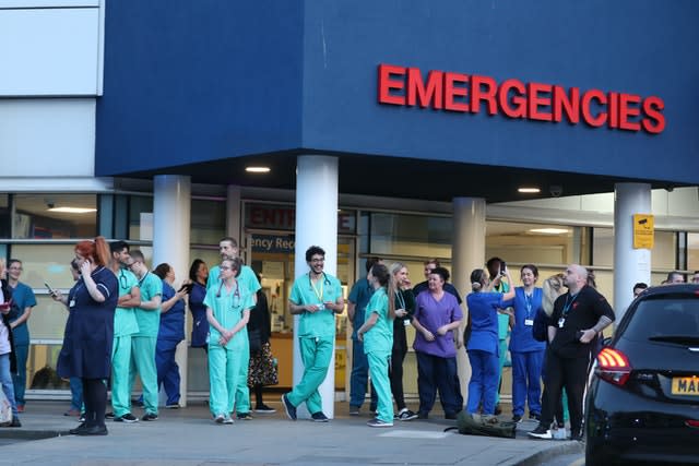 Staff from the Royal Liverpool University Hospital join in the national applause