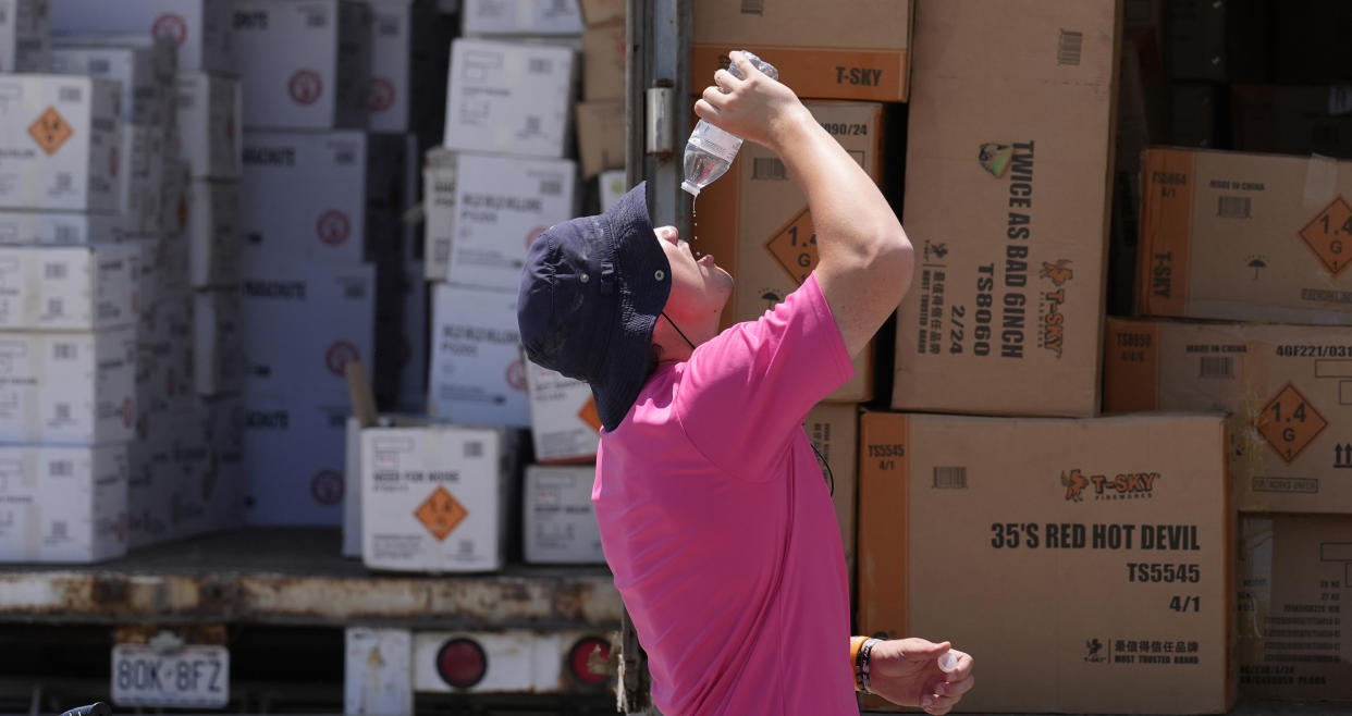 Extreme heat is plaguing major cities in the country, with some regions experiencing health alerts. (Jeff Roberson/AP)
