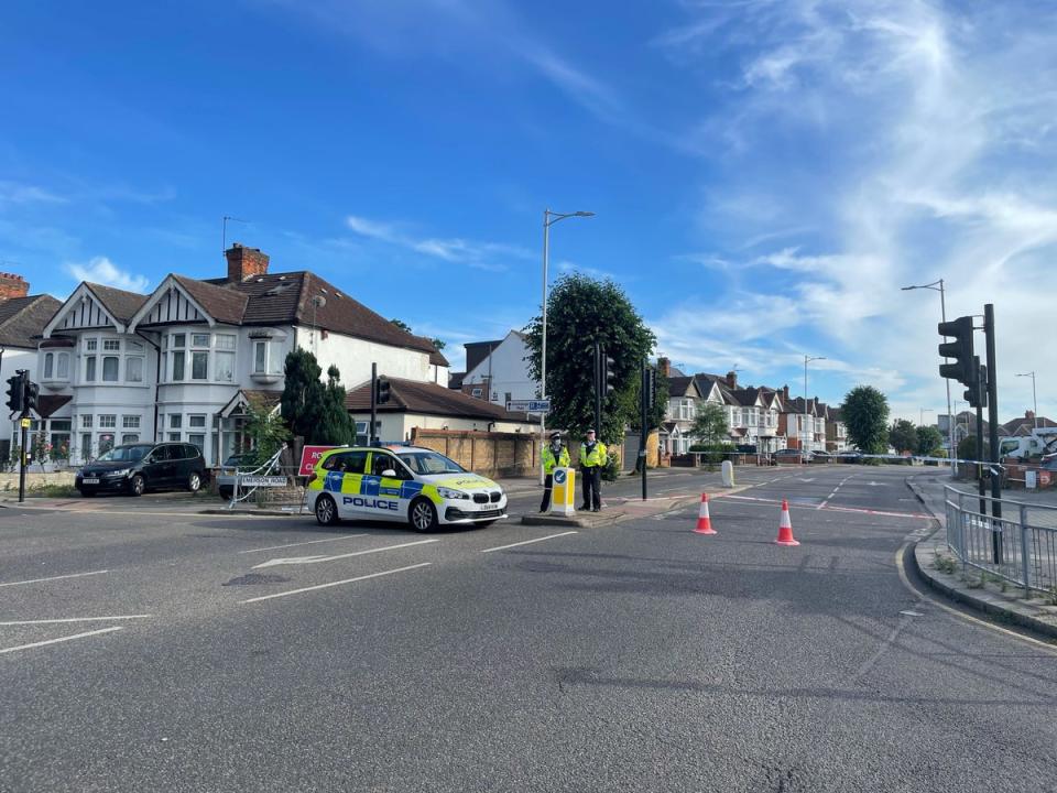 A police cordon in Cranbrook Road, Ilford, where a murder investigation is under way following the death of a 36-year-old woman (PA) (PA Wire)