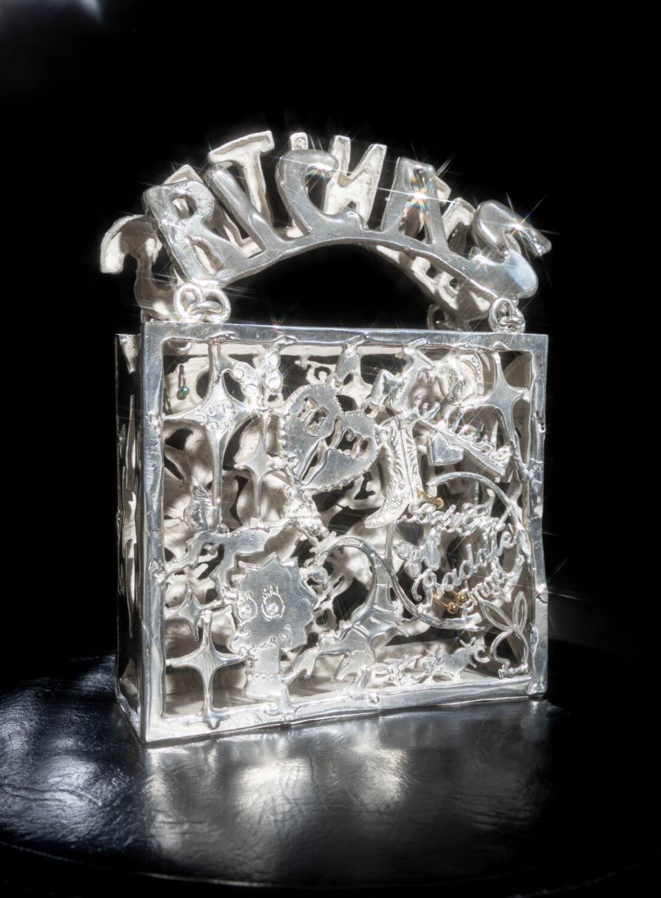 Photo of "KEPERRA" — a sterling silver casted purse made by Georgina Treviño for Image magazine.