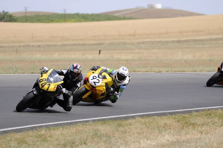 Here's a good shot of valentine (yellow bike) sneaking on up behind and then leaving me in the dust. It happens; Photo by Oxymoron Photography.