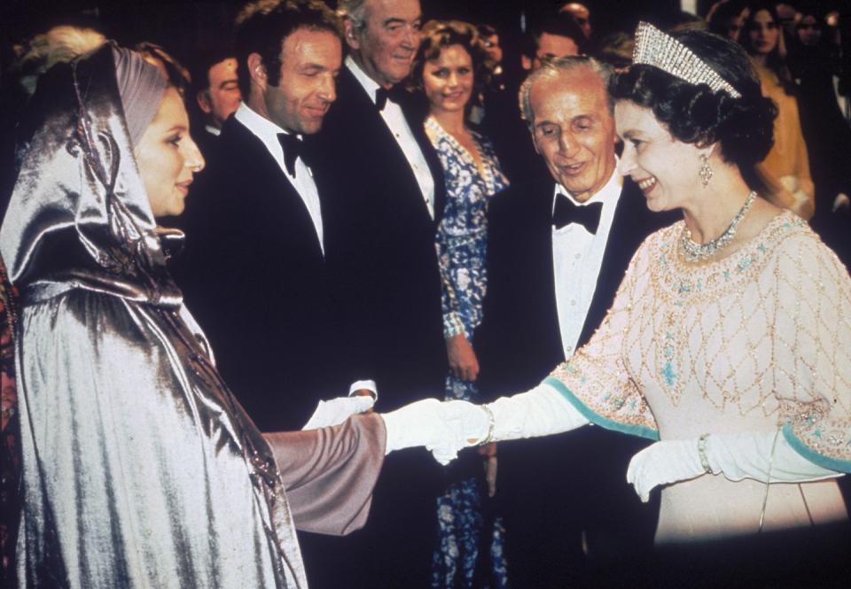 <p>Barbra Streisand showed up in your casual hooded gown to meet the Queen at the premiere of <em>Funny Lady </em>in 1975. She’s Barbra Streisand, she can wear whatever she wants. </p>