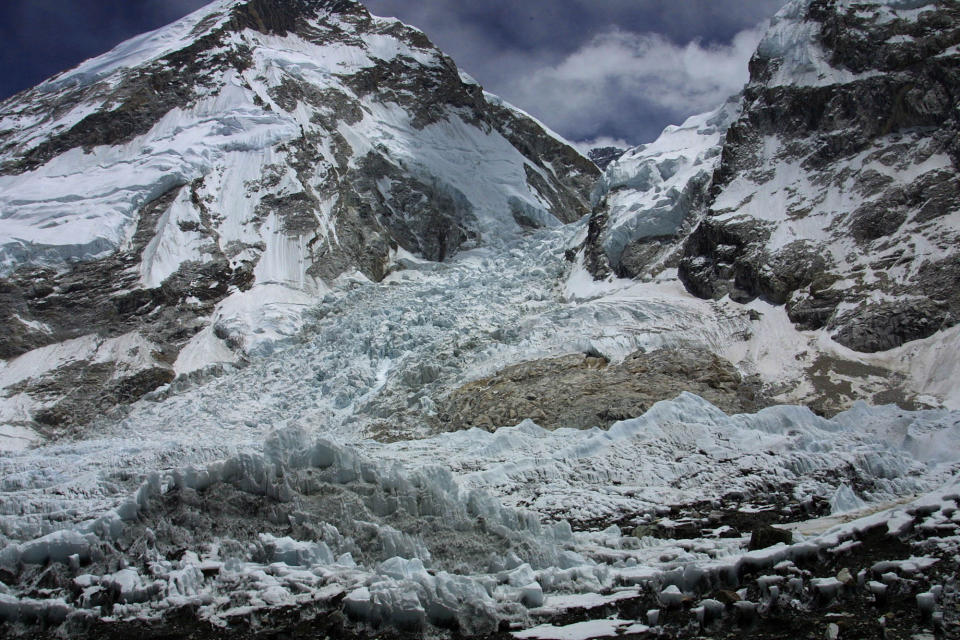 FILE - In this Saturday May 17, 2003 file photo, a view of the Kumbhu icefall, the first hurdle in the ascent to Everest from base camp, is seen from Everest Base camp, where 12 Nepalese guides were killed, Nepal. An avalanche swept down a climbing route on Mount Everest early Friday, killing at least 12 Nepalese guides and leaving three missing in the deadliest disaster on the world's highest peak. (AP Photo/Gurinder Osan, file)