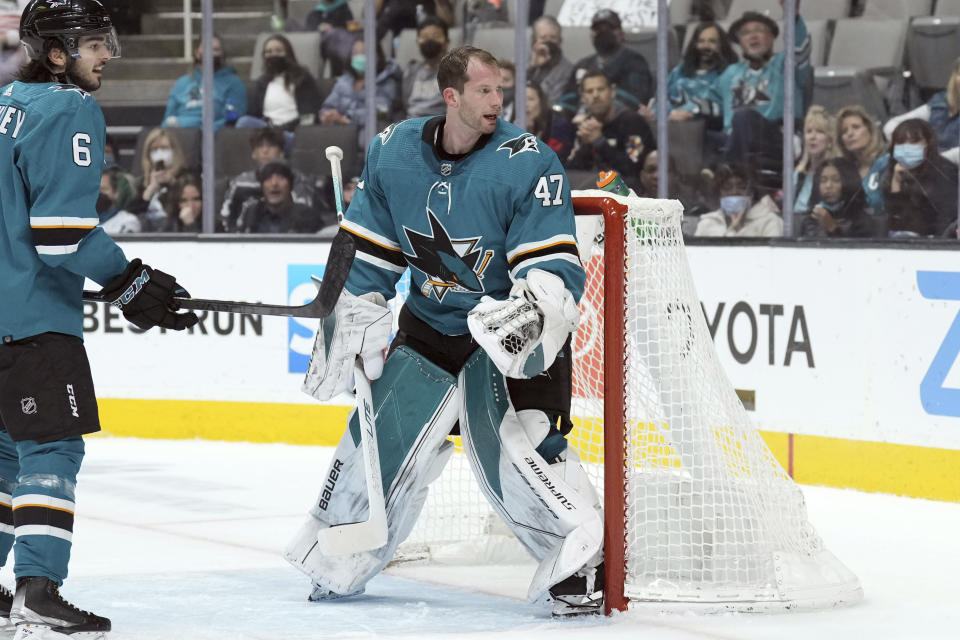 San Jose Sharks goaltender James Reimer (47) loses his helmet during the second period against the Los Angeles Kings during an NHL hockey game in San Jose, Calif., Monday, Jan. 17, 2022. (AP Photo/Darren Yamashita)