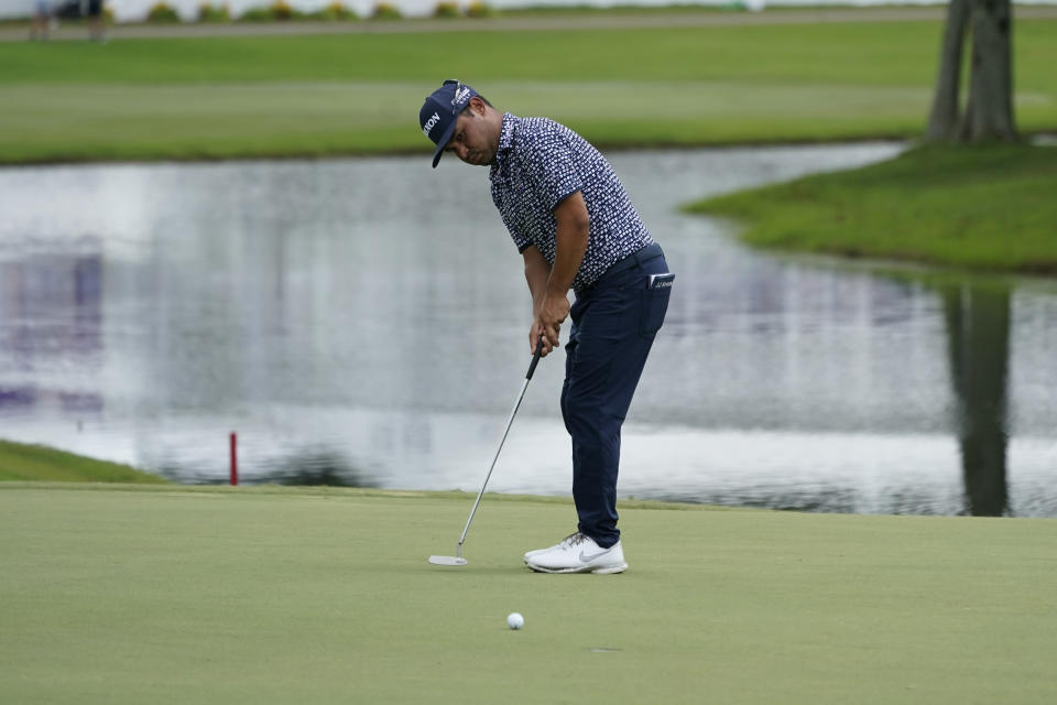 J.J. Spaun putts on the 18th hole during the first round of the St. Jude Championship golf tournament Thursday, Aug. 11, 2022, in Memphis, Tenn. (AP Photo/Mark Humphrey)