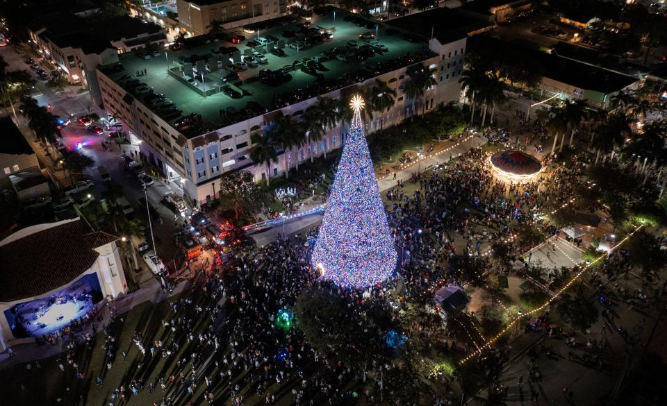 The lighting of the 100-foot Christmas Tree at Old School Square in Delray Beach, Florida on November 28, 2023.