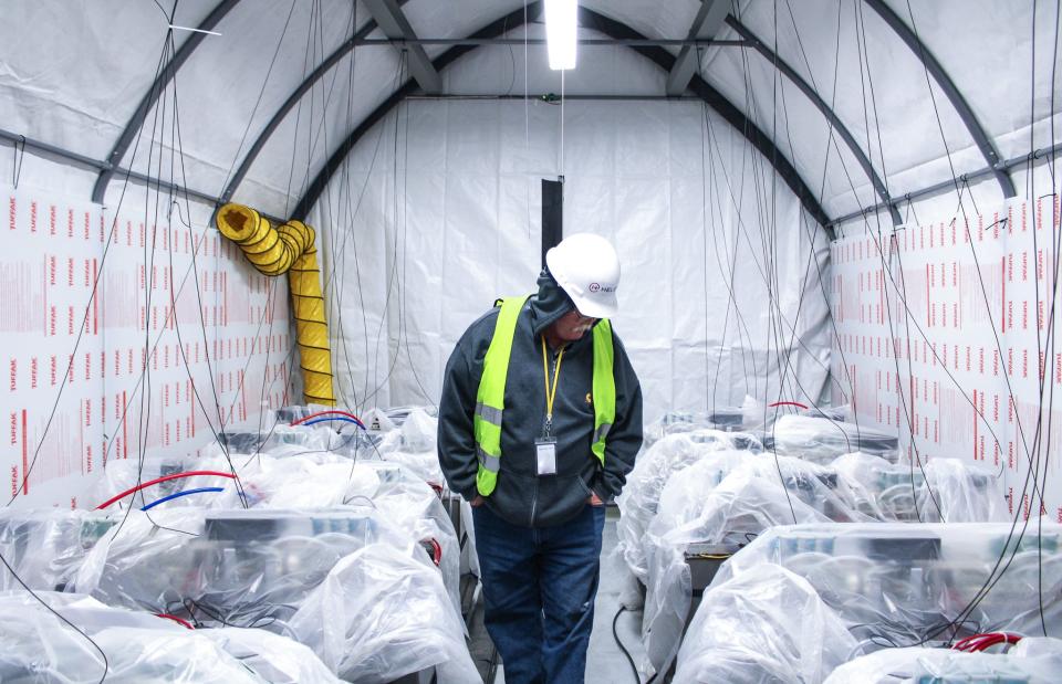 An electrical engineer preparing for Helion’s next pulsed power test.