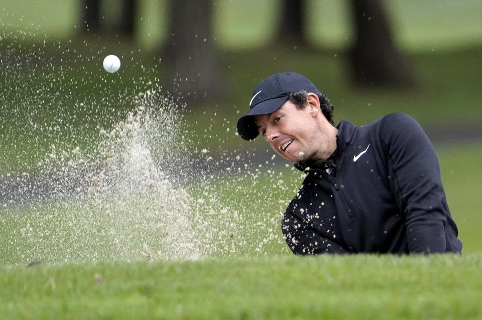 Rory McIlroy of Northern Ireland hits a shot out of a bunker on the sixth hole during the Challenge: Japan Skins event ahead of the Zozo Championship PGA Tour at Accordia Golf Narashino C.C. in Inzai, east of Tokyo, Monday, Oct. 21, 2019. (AP Photo/Lee Jin-man)