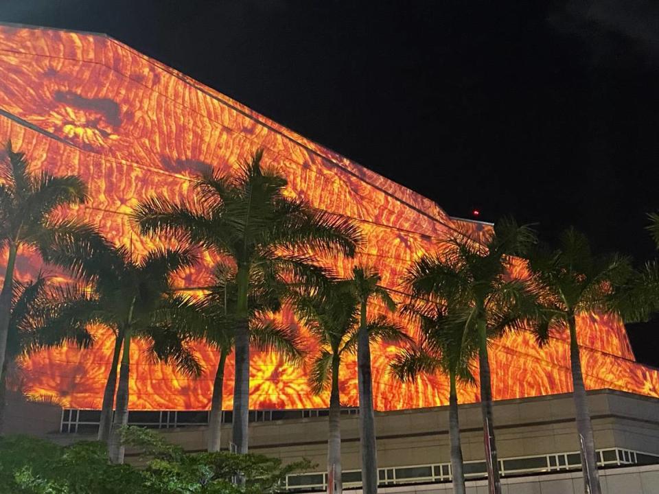 Coral Morphologic is projects images of living coral on the facade of the Knight Concert Hall at the Arsht Center.