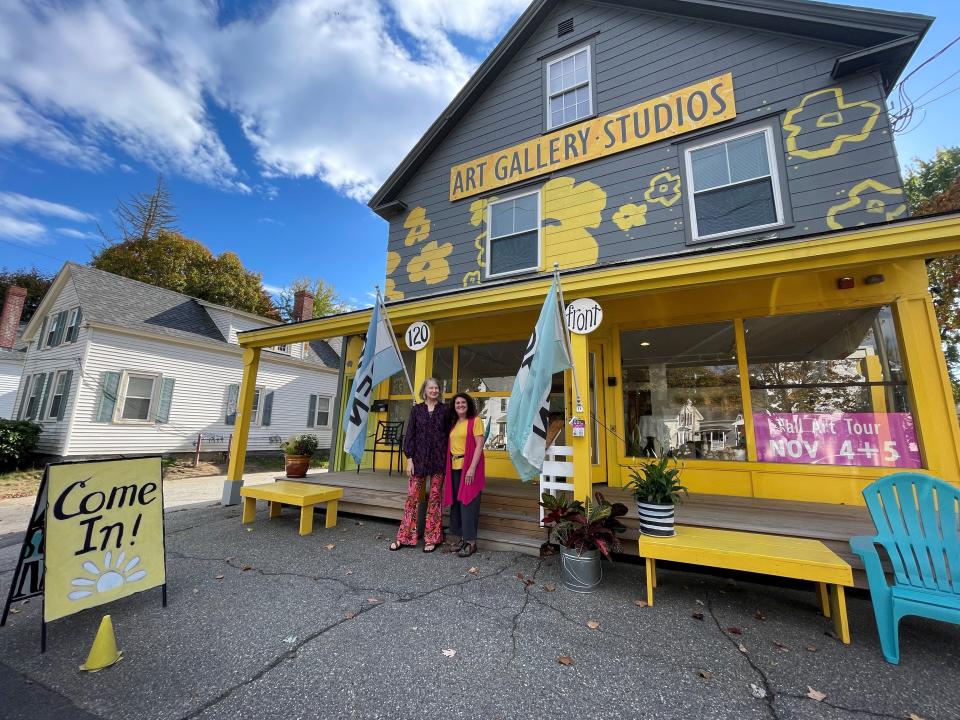 Rose Bryant (left), artist and owner of Art Up Front Street, and artist Anne Kenny (right) in front of the gallery and studios at 120 Front Street.