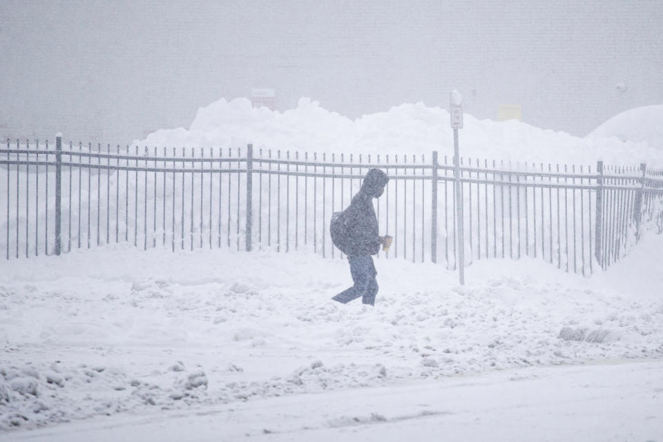 A person walks through the snow in Buffalo, N.Y. (Joshua Bessex / AP)