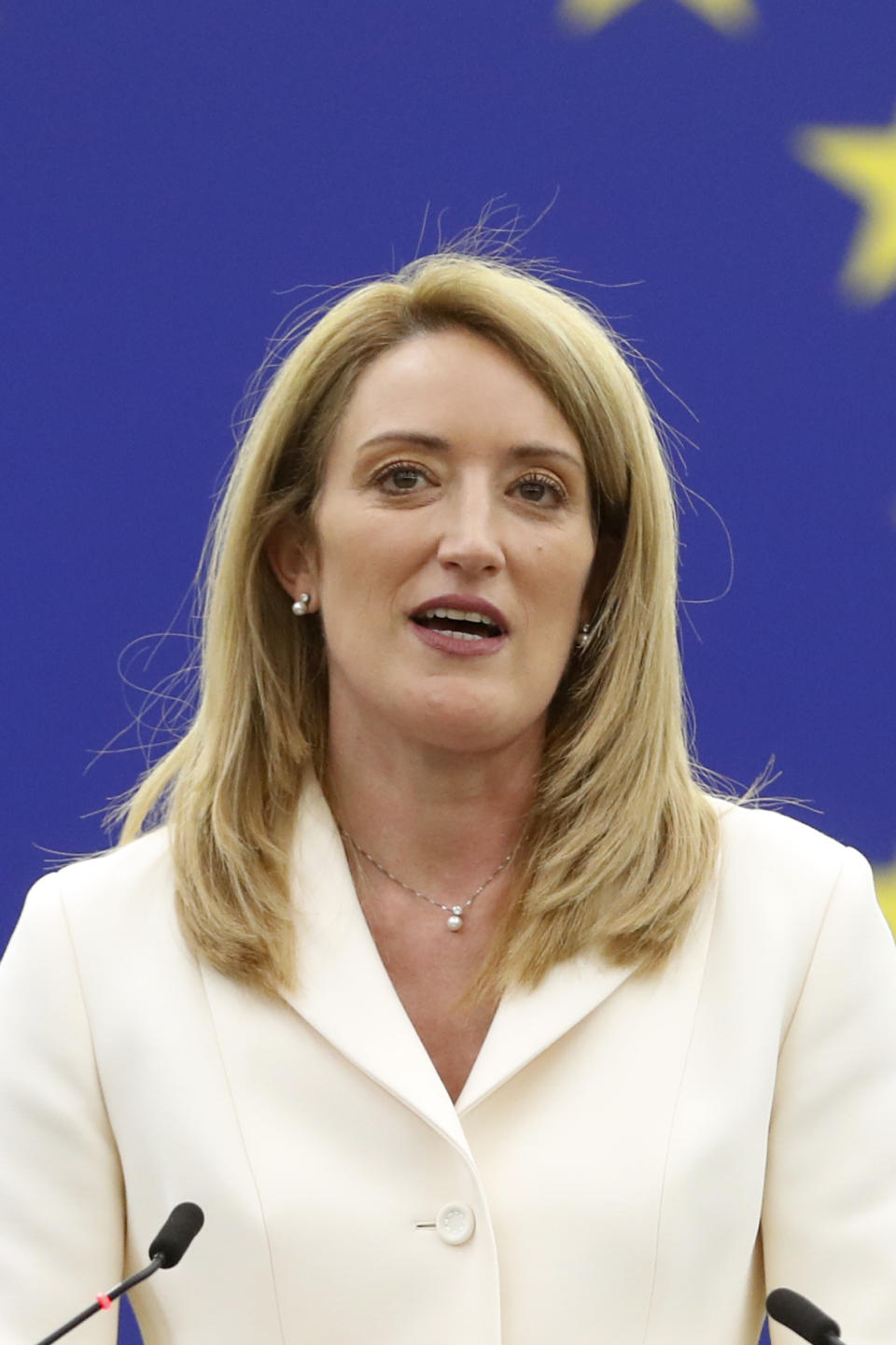 Christian Democrat Roberta Metsola of Malta delivers a speech at the European Parliament, in Strasbourg, eastern France, Tuesday, Jan 18, 2022. Metsola was elected president of the European Union's parliament Tuesday, taking over for a 2 ½-year term following the death of Socialist David Sassoli last week. (AP Photo/Jean-Francois Badias)