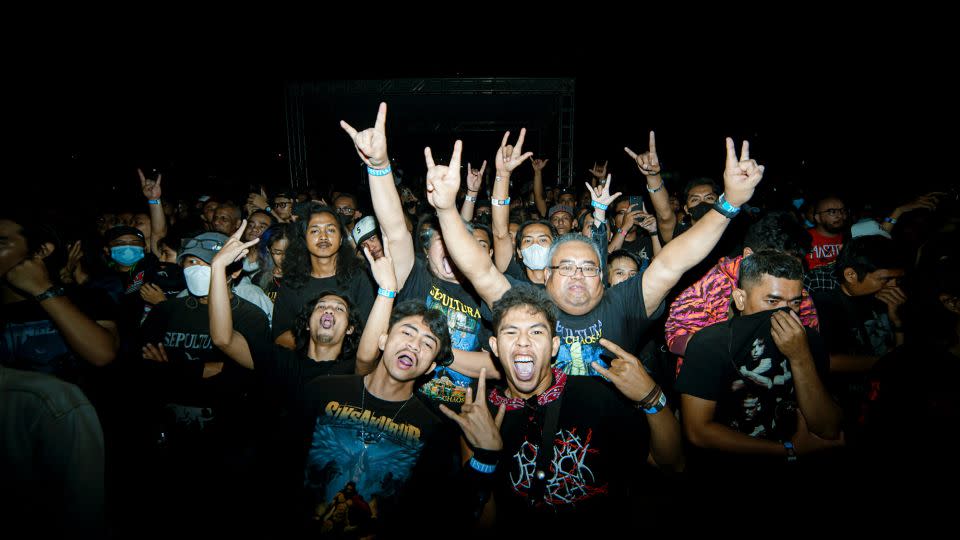 Metalheads rock out in the mosh pit at this year's Jogjarockarta festival. - Rajawali Indonesia