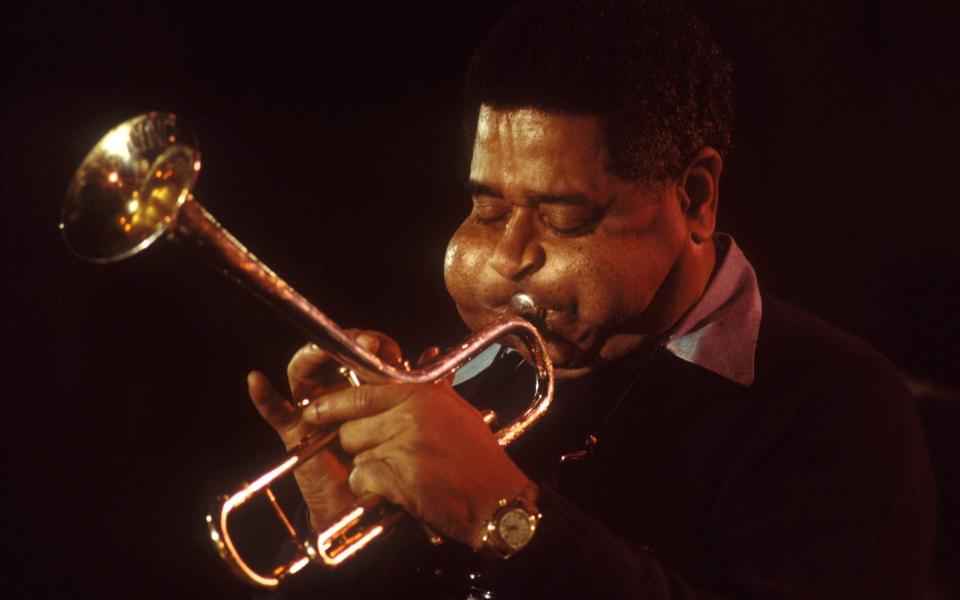 Dizzy Gillespie performing in 1974, shortly after his second presidential run, this time against Richard Nixon - Redferns