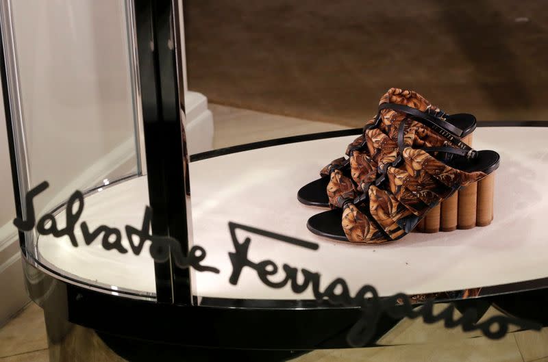 FILE PHOTO: A pair of shoes of Italian luxury shoemaker Salvatore Ferragamo is displayed in the window of the company's store in Zurich