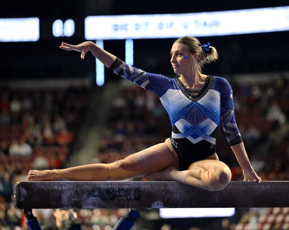 BYU’s Allix Mason, performs on the beam as BYU, Utah, SUU and Utah State meet in the Rio Tinto Best of Utah Gymnastics competition at the Maverick Center in West Valley City on Monday, Jan. 15, 2024. | Scott G Winterton, Deseret News