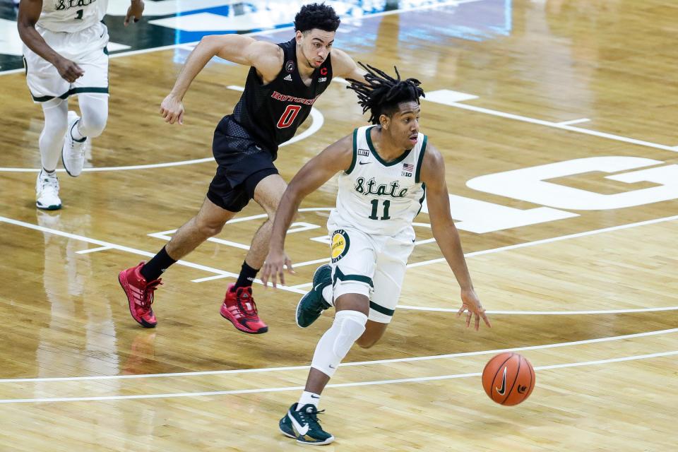 Michigan State guard A.J. Hoggard (11) dribbles against Rutgers during the first half at the Breslin Center in East Lansing, Mich., Tuesday Jan. 5, 2021.