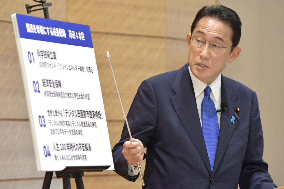 Japan’s former Foreign Minister Fumio Kishida announces his economic policy for the governing Liberal Democratic Party's presidential race, in Tokyo Wednesday, Sept. 8, 2021. Kishida, one of the candidates to be Japan's next prime minister to succeed Yoshihide Suga, said Wednesday the country needs a new type of capitalism to address income and social gaps caused by the pandemic. (Yoshitaka Sugawara/Kyodo News via AP)