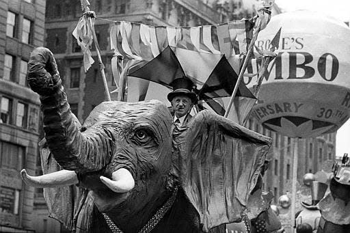 Jumbo the Elephant got his own Macy's Thanksgiving Parade float. Here's Jimmy Durante aboard in 1962.