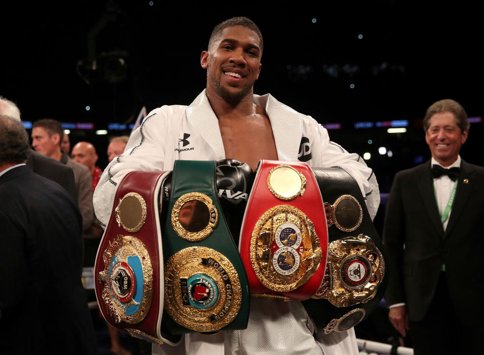 Anthony Joshua holds the IBF-WBA-WBO championship heavyweight belts. (AP)