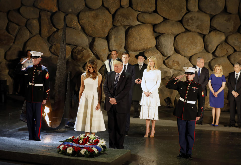 White House senior advisor Jared Kushner, Ivanka Trump, first lady Melania Trump, U.S. President Donald Trump, Israel's Prime Minister Benjamin Netanyahu (3rd L back), his wife Sara (2nd L) and Chairman of the Yad Vashem Holocaust Memorial, Avner Shalev, attend a wreath laying ceremony during a visit to the Yad Vashem Holocaust Memorial museum in Jerusalem May 23, 2017. (Photo: POOL New / Reuters)