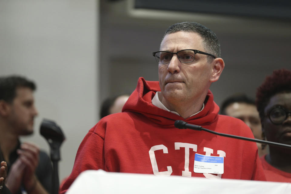 Chicago Teachers Union President Jesse Sharkey answers reporters' questions after a meeting of the CTU House of Delegates, at the CTU Center, Wednesday, Oct. 16, 2019, in Chicago. Chicago parents and community groups are scrambling to prepare for a massive teachers' strike set to begin Thursday, prompting the city to preemptively cancel classes in the nation's third-largest school district. (John J. Kim/Chicago Tribune via AP)